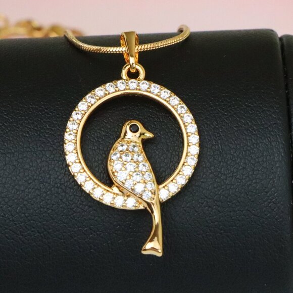 "Rose Gold Bird Pendant with Sparkling Crystals in Circular Frame, XPPT1525 - Picture 1 of 13